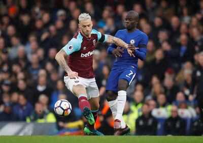 Soccer Football - Premier League - Chelsea vs West Ham United - Stamford Bridge, London, Britain - April 8, 2018   West Ham United's Marko Arnautovic in action with Chelsea's N'Golo Kante    REUTERS/Eddie Keogh    EDITORIAL USE ONLY. No use with unauthorized audio, video, data, fixture lists, club/league logos or "live" services. Online in-match use limited to 75 images, no video emulation. No use in betting, games or single club/league/player publications.  Please contact your account representative for further details.