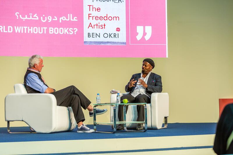 Ben Okri (right) speaking at the Abu Dhabi Dhabi International Book Fair on Saturday. Courtesy DCT