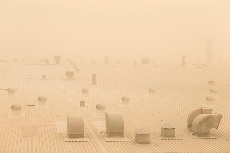 RAS AL KHAIMAH, UNITED ARAB EMIRATES, APRIL 2, 2015. Outside RAK Ceramics, the sandstorm hits hard today in Al Hamra Village. Photo: Reem Mohammed / The National   *** Local Caption ***  RM_20150402_RAK09.jpg