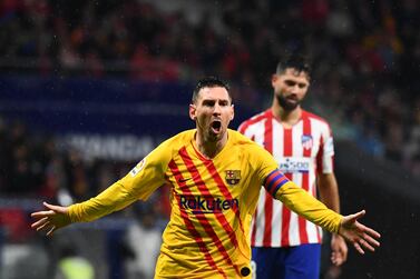 TOPSHOT - Barcelona's Argentine forward Lionel Messi celebrates after scoring during the Spanish league football match between Club Atletico de Madrid and FC Barcelona at the Wanda Metropolitano stadium in Madrid, on December 1, 2019. / AFP / GABRIEL BOUYS