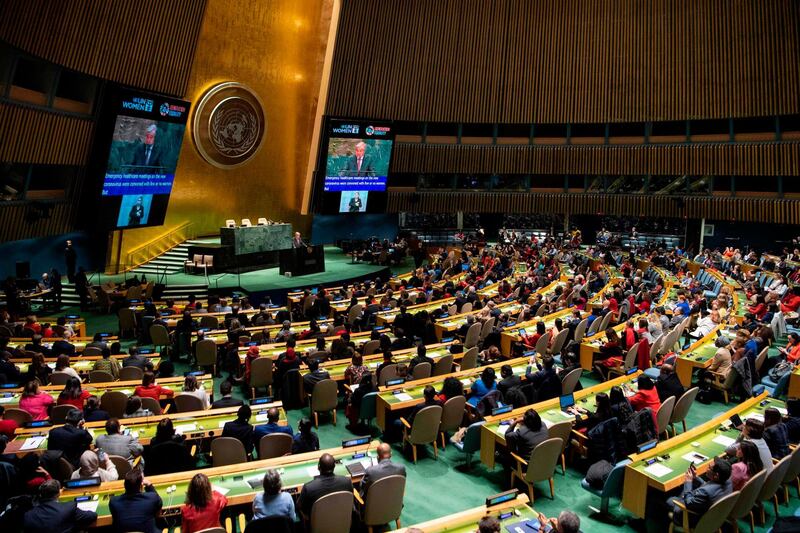 This UN handout photo shows UN Secretary-General António Guterres (on screens) as he addresses an event on March 6, 2020, marking March 8,  as International Women’s Day  on the theme, “I am Generation Equality: Realizing Women’s Rights” at the United Nations in New York. The United Nations on March 9, 2020 adopted a stripped-down political declaration on women's rights that seeks to preserve gains under threat but does not advocate new ways to ensure progress toward equality. The declaration was adopted during the 64th session of the Commission on the Status of Women, which has been drastically reduced from a two-week affair to a single hours-long meeting because of the global coronavirus outbreak. 
 - RESTRICTED TO EDITORIAL USE - MANDATORY CREDIT "AFP PHOTO /UNITED NATIONS/ESKINDER DEBEBE/HANDOUT " - NO MARKETING - NO ADVERTISING CAMPAIGNS - DISTRIBUTED AS A SERVICE TO CLIENTS
 / AFP / UNITED NATIONS / Eskinder DEBEBE / RESTRICTED TO EDITORIAL USE - MANDATORY CREDIT "AFP PHOTO /UNITED NATIONS/ESKINDER DEBEBE/HANDOUT " - NO MARKETING - NO ADVERTISING CAMPAIGNS - DISTRIBUTED AS A SERVICE TO CLIENTS
