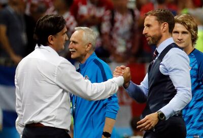 epa06882050 England's manager Gareth Southgate (R) and Croatia's coach Zlatko Dalic react after the FIFA World Cup 2018 semi final soccer match between Croatia and England in Moscow, Russia, 11 July 2018.

(RESTRICTIONS APPLY: Editorial Use Only, not used in association with any commercial entity - Images must not be used in any form of alert service or push service of any kind including via mobile alert services, downloads to mobile devices or MMS messaging - Images must appear as still images and must not emulate match action video footage - No alteration is made to, and no text or image is superimposed over, any published image which: (a) intentionally obscures or removes a sponsor identification image; or (b) adds or overlays the commercial identification of any third party which is not officially associated with the FIFA World Cup)  EPA/FELIPE TRUEBA   EDITORIAL USE ONLY