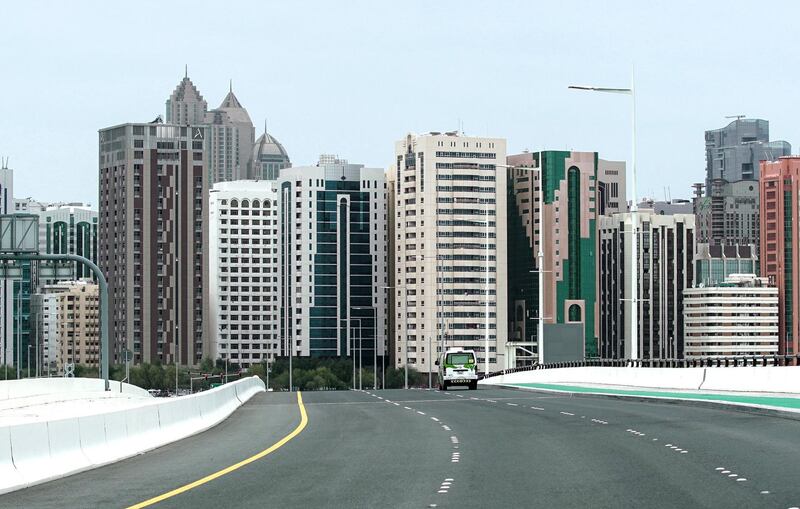 Abu Dhabi, United Arab Emirates, April 20, 2020. 
  A delivery van crosses back to downtown Abu Dhabi from Al Maryah Island on a hazy day.
Victor Besa / The National
Section:  NA
For:  Stock images