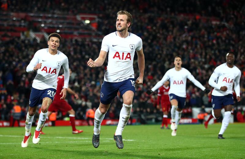 LIVERPOOL, ENGLAND - FEBRUARY 04:  Harry Kane of Tottenham Hotspur celebrates after scoring his sides second goal and his 100th Premier League goal during the Premier League match between Liverpool and Tottenham Hotspur at Anfield on February 4, 2018 in Liverpool, England.  (Photo by Clive Brunskill/Getty Images)