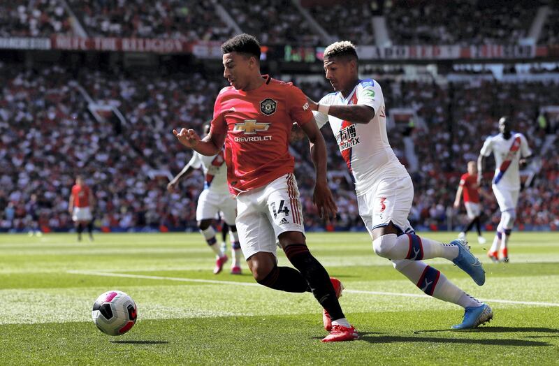 Soccer Football - Premier League - Manchester United v Crystal Palace - Old Trafford, Manchester, Britain - August 24, 2019  Manchester United's Jesse Lingard in action with Crystal Palace's Patrick van Aanholt   Action Images via Reuters/Paul Childs  EDITORIAL USE ONLY. No use with unauthorized audio, video, data, fixture lists, club/league logos or "live" services. Online in-match use limited to 75 images, no video emulation. No use in betting, games or single club/league/player publications.  Please contact your account representative for further details.