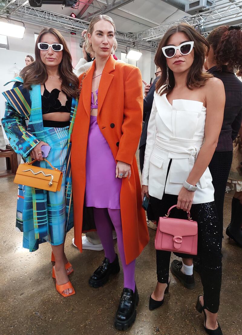 Bubblegum pink mixed with red, and blue with orange at London Fashion Week. 