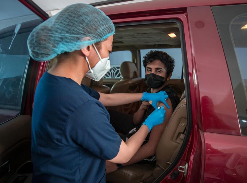 Shenaz Abdul Salam, 13 gets vaccinatedat the  SEHA Covid-19 Drive-Through Service Center at the Corniche in Abu Dhabi on June 17th, 2021.  There is a huge demand for vaccinations and PCRs after the green pass restrictions. Victor Besa / The National.
Reporter: Shireena Al Nowais for News