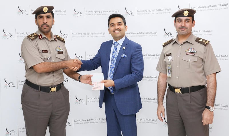 Dr Shamsheer Vayalil, founder and chairman of VPS Healthcare, receives his golden visa. Courtesy: Dr Shamsheer Vayalil