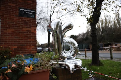 Tributes at the scene of a stabbing on Sewell Road in Abbey Wood on November 27.  Getty Images