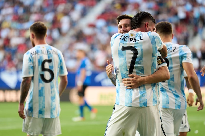 Lionel Messi of Argentina celebrates with teammate Rodrigo De Paul of Argentina after scoring his team's third goal against Estonia. Messi would score all five of Argentina's goals. Getty Images