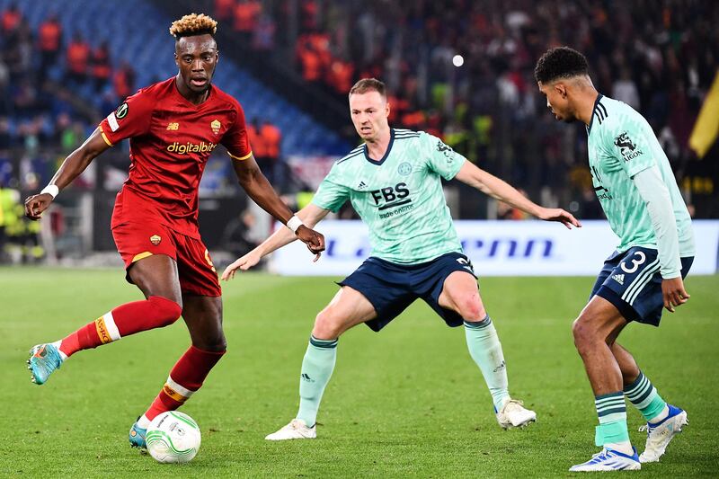 Roma forward Tammy Abraham fights for the ball with Leicester's Jonny Evans and Wesley Fofana. AFP