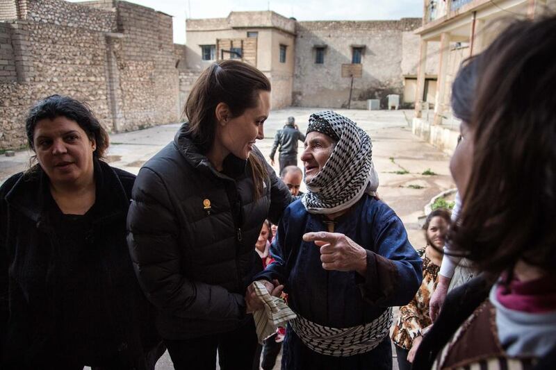 Angelina Jolie met displaced Iraqis who are members of the minority Christian community, living in an abandoned school in Al Qosh, northern Iraq on January 26. Reuters / UNHCR/Andrew McConnell/Handout via Reuters