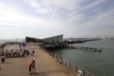 Showing the full length of the pier and Southend, Southend Pier Cultural Centre, Southend, United Kingdom, Architect: White Architects, 2012, Main exterior with people taken from the lifeboat station. (Photo by View Pictures/UIG via Getty Images)