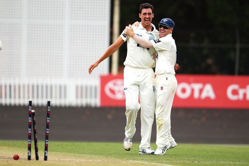 SYDNEY, AUSTRALIA - NOVEMBER 06:  Mitchell Starc of the Blues celebrates with David Warner of the Blues after bowling Simon Mackin of the Warriors to take a hat-trick during day three of the Sheffield Shield match between New South Wales and Western Australia at Hurstville Oval on November 6, 2017 in Sydney, Australia.  (Photo by Mark Kolbe/Getty Images)