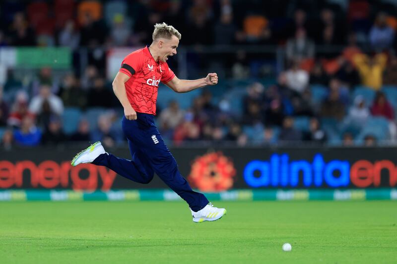 Sam Curran of England celebrates taking the wicket of Tim David of Australia. Getty 