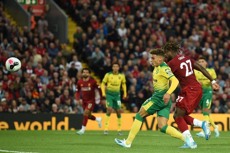 Liverpool striker Divock Origi scores his team's fourth goal. AFP