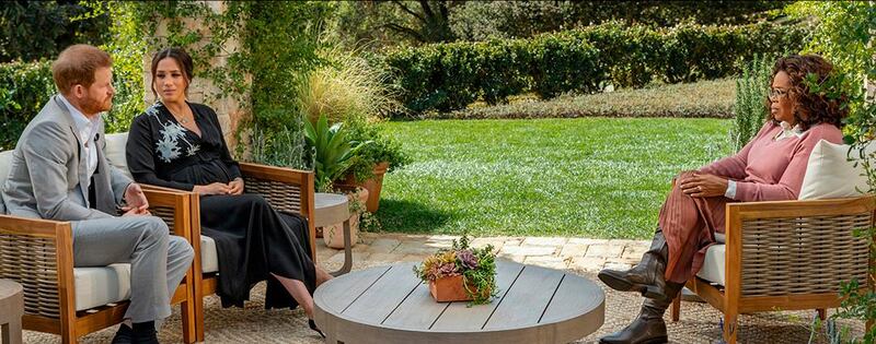 Oprah Winfrey wears a blush pink sweater and pleated skirt to interview Prince Harry and Meghan Markle for a CBS interview on March 7, 2021. Courtesy OSN