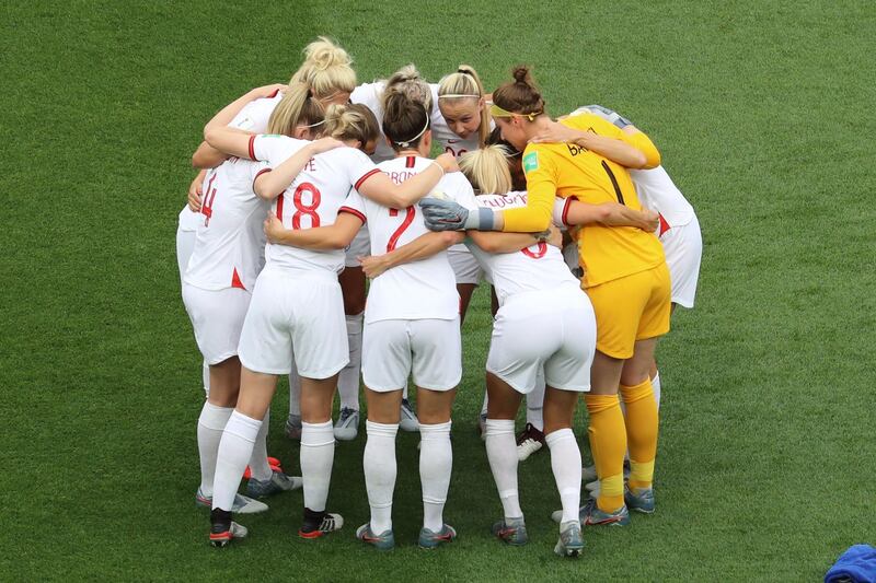 England players in a pre-match huddle before their Group D encounter against Scotland in Nice. England won the match 2-1.  AFP