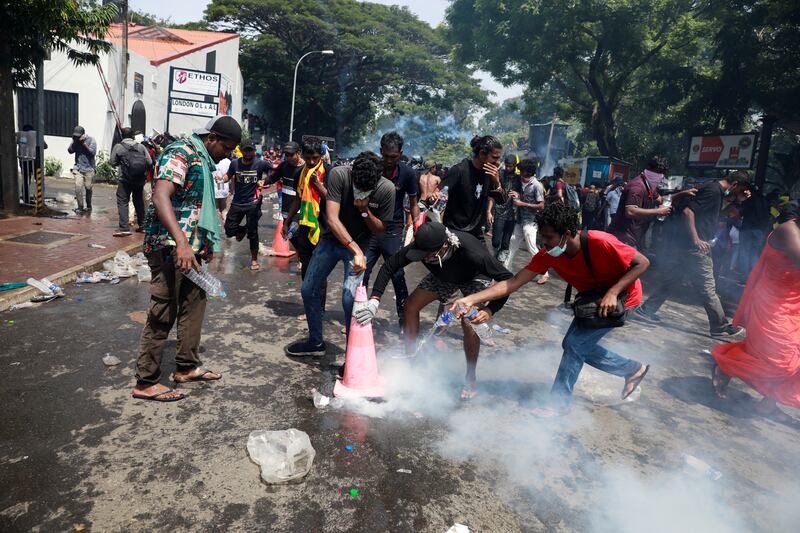 Police fire tear gas to control the crowds. Reuters