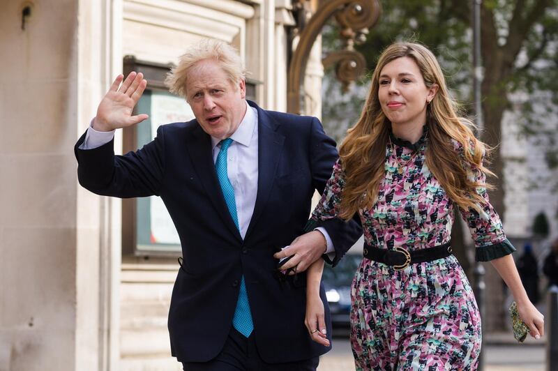 Britain's Prime Minster Boris Johnson and his partner Carrie Symonds arrive at a polling station to cast their votes for the local elections in London. Britons go to the polls today to vote in local and mayoral elections. EPA