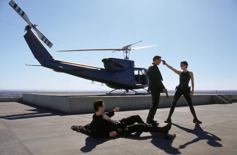 Keanu Reeves and Carrie-Anne Moss in The Matrix. Courtesy Warner Bros.