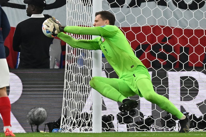 POLAND RATINGS: Wojciech Szczesny - 6, His save to deny Tchouameni’s shot from range was one of a host of stops from the Polish goalkeeper. He also bravely met Giroud’s ball under pressure from Dembele and made a strong punch over the top of Varane. Nothing he could do about any of the goals despite him getting a fingertip to the last.

AFP