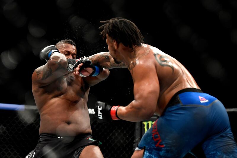 JACKSONVILLE, FLORIDA - MAY 09: Greg Hardy (R) of the United States punches Yorgan De Castro (L) of Cape Verde in their Heavyweight fight during UFC 249 at VyStar Veterans Memorial Arena on May 09, 2020 in Jacksonville, Florida.   Douglas P. DeFelice/Getty Images/AFP