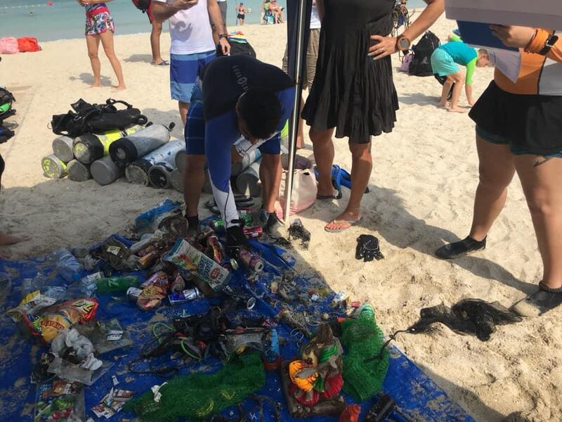 A team of volunteers from Divers Down UAE pictured during a recent beach clean-up event.
