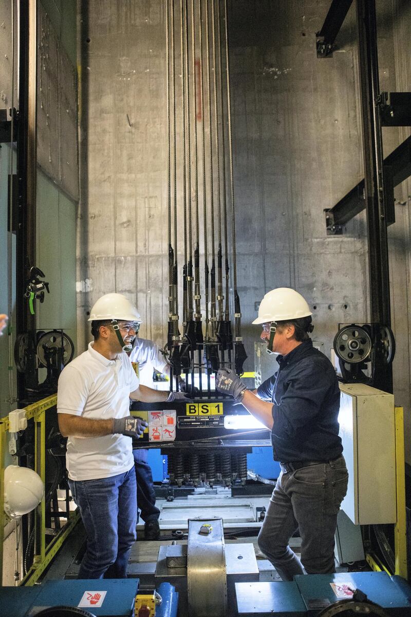 Richard Hammond with Bashar Kassab, Senior Director Facilities Management at Burj Khalifa about to service the lift in Burj Khalifa tower, Dubai.