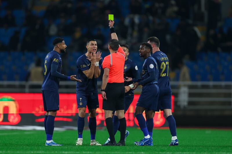 Cristino Ronaldo remonstrates with the referee after receiving a yellow card. Getty Images