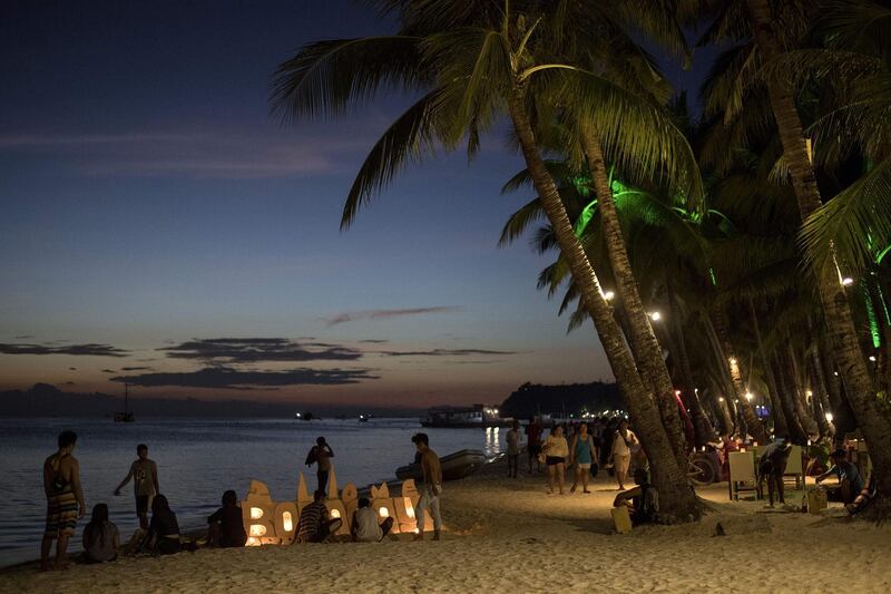 Workers make a sand castle on the Philippine island of Boracay. Noel Celis / AFP