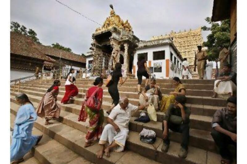 Devotees visit the Sree Padmanabhaswamy Temple in the Indian state of Kerala. A letter-writer comments on the vast and ancient treasure found in the temple's vaults. Aijaz Rahi / AP
