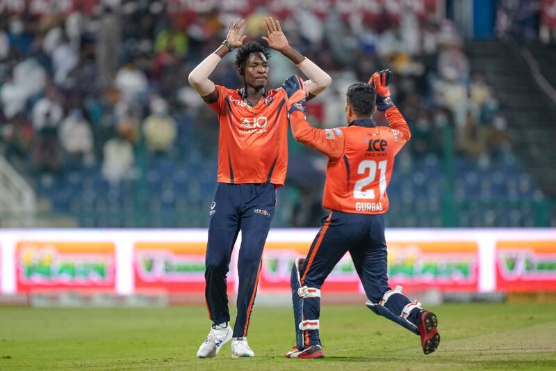 Dominic Drakes, left, celebrates a wicket with Rahmanullah Gurbaz. Photo: Abu Dhabi T10