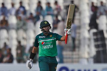 Pakistan's Imam-ul-Haq celebrates after scoring fifty during the third one-day international cricket match between Pakistan and West Indies at the Multan Cricket Stadium, in Multan, Pakistan, Sunday, June 12, 2022.  (AP Photo / Anjum Naveed)