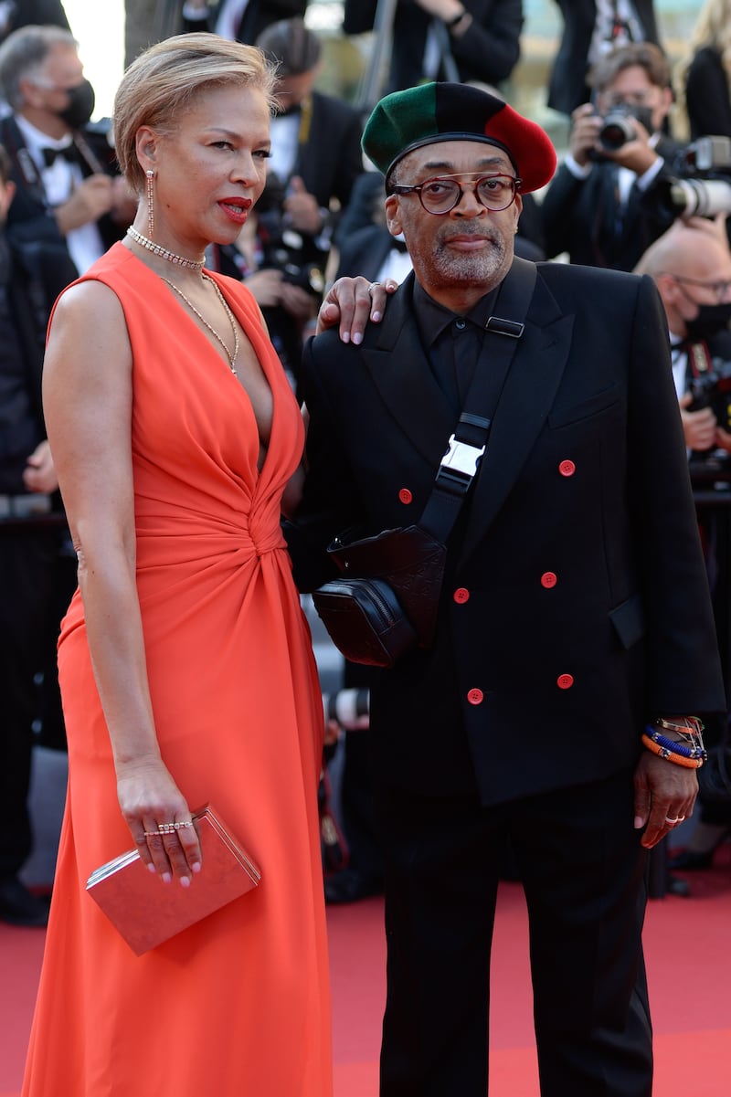 Spike Lee, in Louis Vuitton, and Tonya Lewis Lee attend the screening of 'Benedetta' during the 74th annual Cannes Film Festival on July 9, 2021.