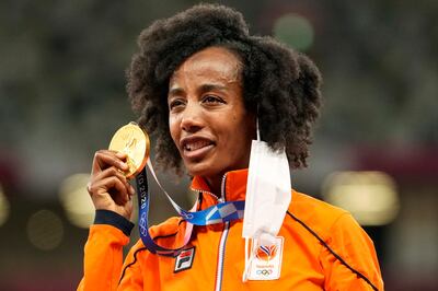 Hassan was flagbearer at the Tokyo Olympics' closing ceremony for the Netherlands, the country where she arrived 13 years ago as a refugee. AP Photo