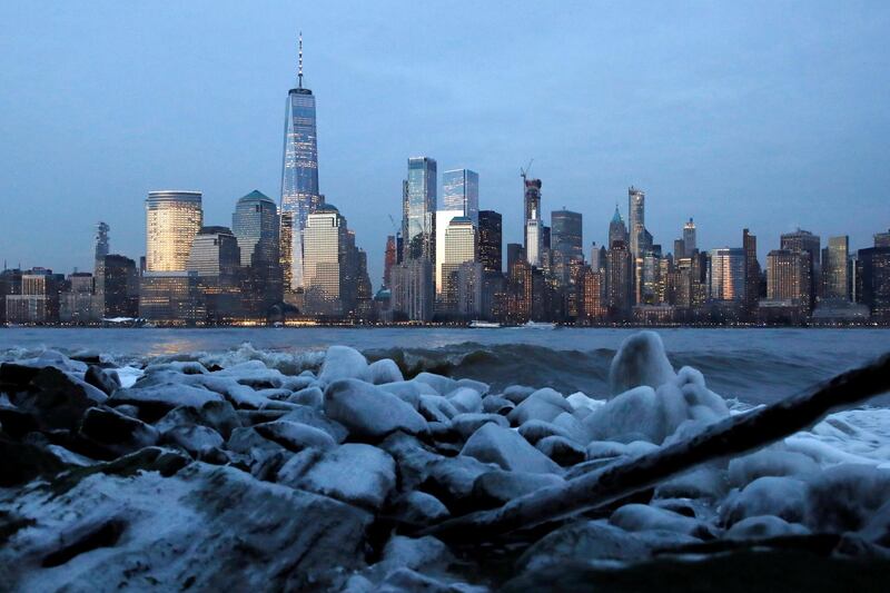 Downtown Manhattan in New York City is seen over ice that formed on the banks of the Hudson River during below freezing temperatures from Jersey City, New Jersey, US. REUTERS