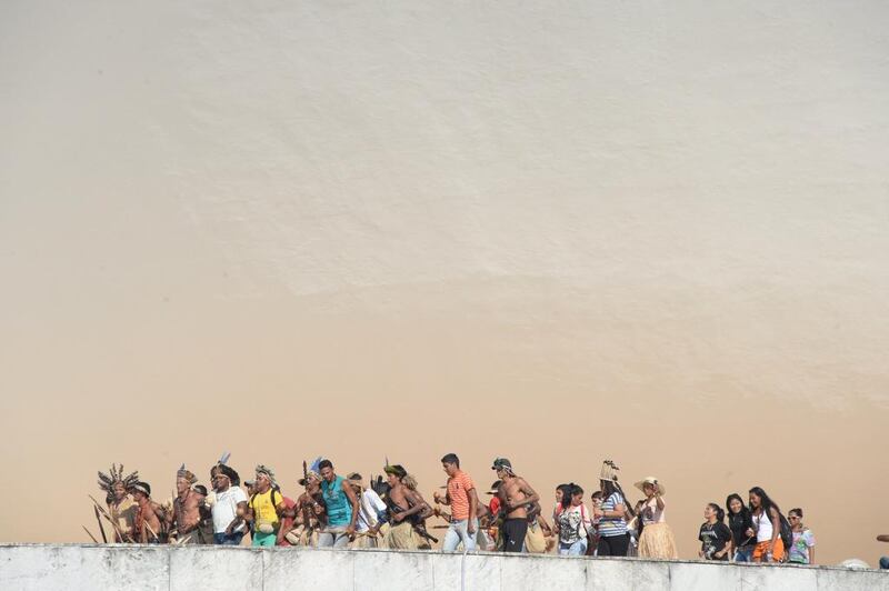 Brazilian natives from different ethnic groups protest atop of the National Congress in Brasilia. The demonstration is aimed to attract the attention on the Amazonia situation in the framework of next Fifa World Cup. Evaristo SA / AFP