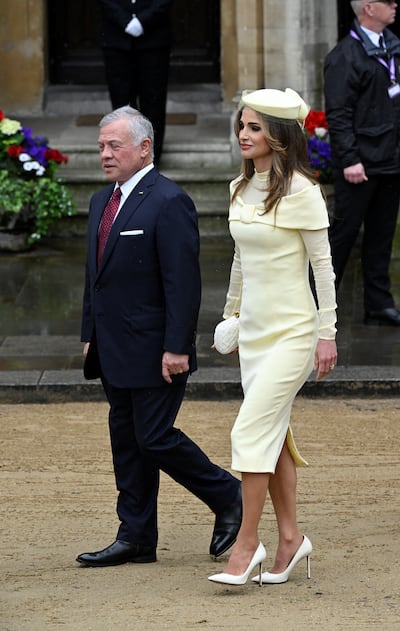 King Abdullah II of Jordan and Queen Rania arrive at Westminster Abbey. Reuters