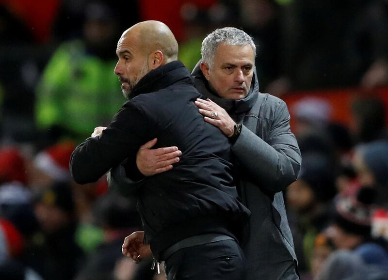 FILE PHOTO: Soccer Football - Premier League - Manchester United vs Manchester City - Old Trafford, Manchester, Britain - December 10, 2017   Manchester City manager Pep Guardiola and Manchester United manager Jose Mourinho at the end of the match                               Action Images via Reuters/Carl Recine    EDITORIAL USE ONLY. No use with unauthorized audio, video, data, fixture lists, club/league logos or "live" services. Online in-match use limited to 75 images, no video emulation. No use in betting, games or single club/league/player publications. Please contact your account representative for further details./File Photo