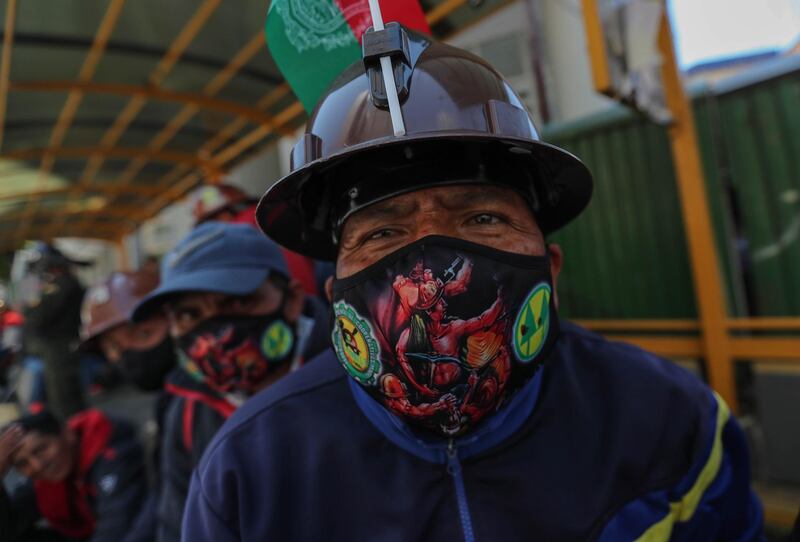 Bolivian miners march near the headquarters of the Government and the Parliament in La Paz, Bolivia.  EPA