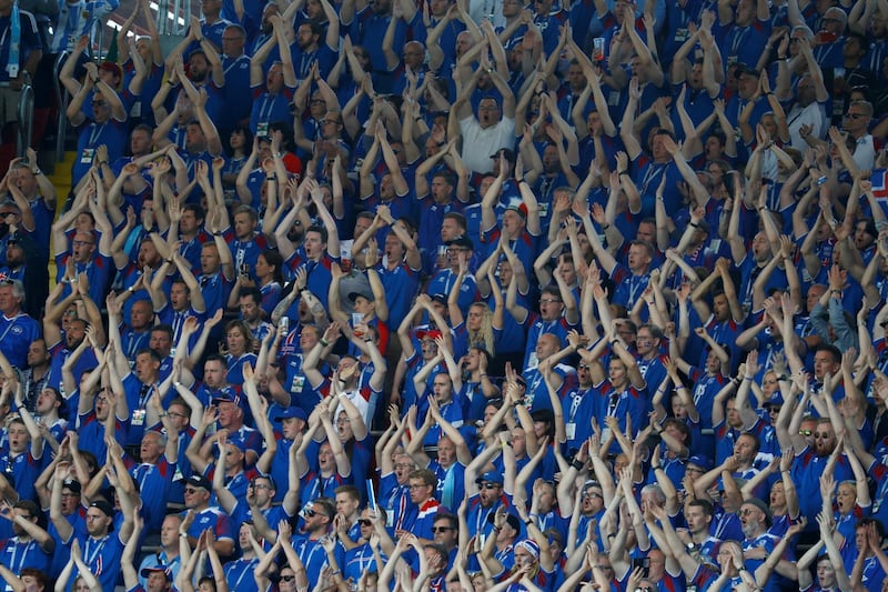 The famously loud  Iceland fans cheer their side on. Kai Pfaffenbach / Reuters
