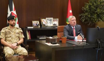 A handout picture released by the Jordanian Royal Palace on May 4, 2020 shows Jordanian King Abdullah II (R) and his son Crown Prince Hussein (L) attending by videoconference the Royal Highness Crown Prince Al Hussein, participates in the Coronavirus Global Response international pledging event, organised by the European Union.  - RESTRICTED TO EDITORIAL USE - MANDATORY CREDIT "AFP PHOTO / JORDANIAN ROYAL PALACE / YOUSEF ALLAN" - NO MARKETING NO ADVERTISING CAMPAIGNS - DISTRIBUTED AS A SERVICE TO CLIENTS
 / AFP / Jordanian Royal Palace / Yousef ALLAN / RESTRICTED TO EDITORIAL USE - MANDATORY CREDIT "AFP PHOTO / JORDANIAN ROYAL PALACE / YOUSEF ALLAN" - NO MARKETING NO ADVERTISING CAMPAIGNS - DISTRIBUTED AS A SERVICE TO CLIENTS
