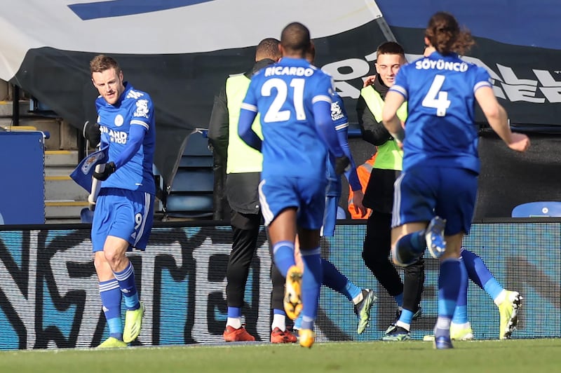 Leicester City's English striker Jamie Vardy (L) celebrates with teammates after he scores his team's second goal during the English Premier League football match between Leicester City and Liverpool at King Power Stadium in Leicester, central England on February 13, 2021.  - RESTRICTED TO EDITORIAL USE. No use with unauthorized audio, video, data, fixture lists, club/league logos or 'live' services. Online in-match use limited to 120 images. An additional 40 images may be used in extra time. No video emulation. Social media in-match use limited to 120 images. An additional 40 images may be used in extra time. No use in betting publications, games or single club/league/player publications.
 / AFP / POOL / CARL RECINE / RESTRICTED TO EDITORIAL USE. No use with unauthorized audio, video, data, fixture lists, club/league logos or 'live' services. Online in-match use limited to 120 images. An additional 40 images may be used in extra time. No video emulation. Social media in-match use limited to 120 images. An additional 40 images may be used in extra time. No use in betting publications, games or single club/league/player publications.
