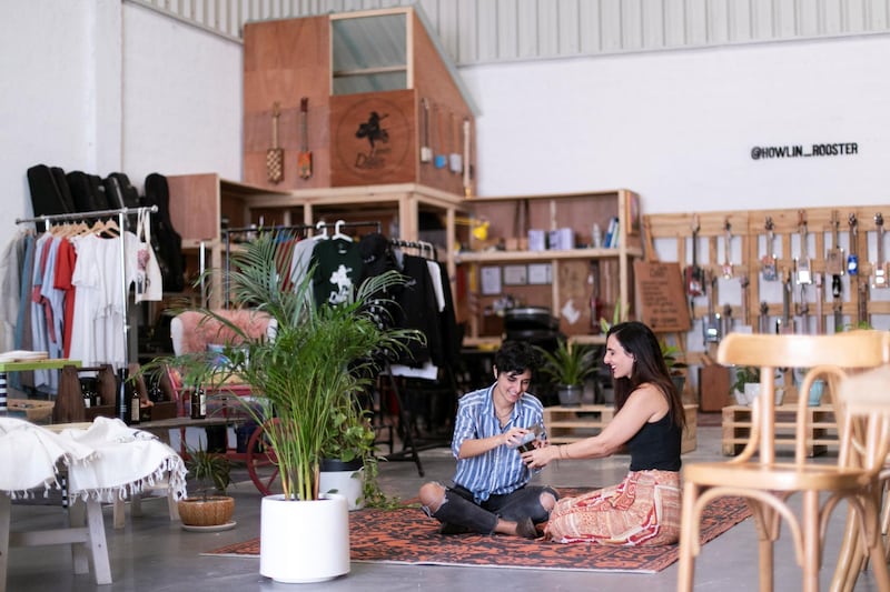 DUBAI, UNITED ARAB EMIRATES - May 30 2019.

Rania Kana’an, left, and her sister Zaina, co-founded KAVE, The Story of Things, an upcycling cafe concept in Al Serkal avenue.

The space offers different workshops that take place weekly, including guitar making, embroidery lessons, meditation sessions, bottle cutting workshops and chaircycling rides.

(Photo by Reem Mohammed/The National)

Reporter: 
Section: WK