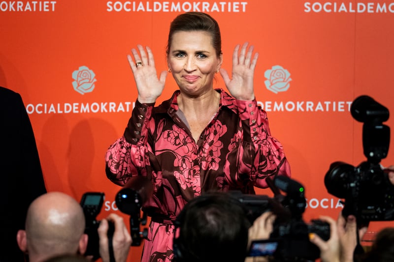 Denmark's Prime Minister Mette Frederiksen celebrates her party's election night gains. Reuters