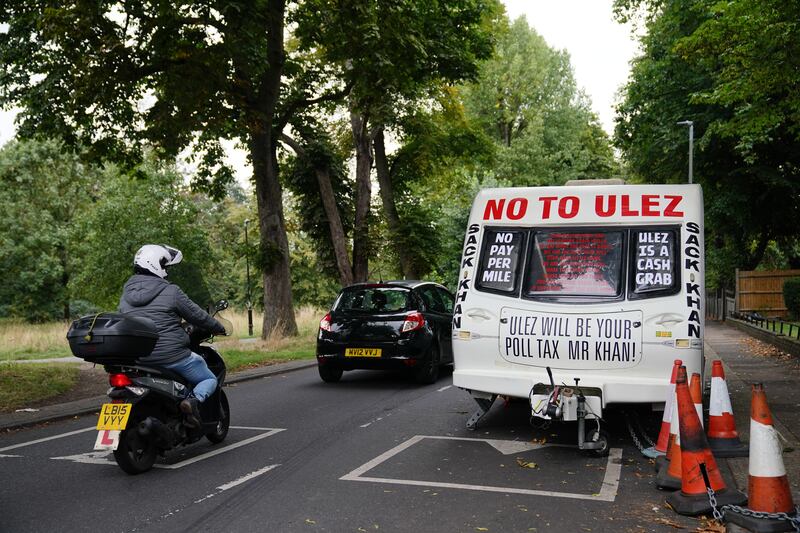 A caravan parked near the home of London Mayor Sadiq Khan as protests mount over the introduction of the Ulez. PA