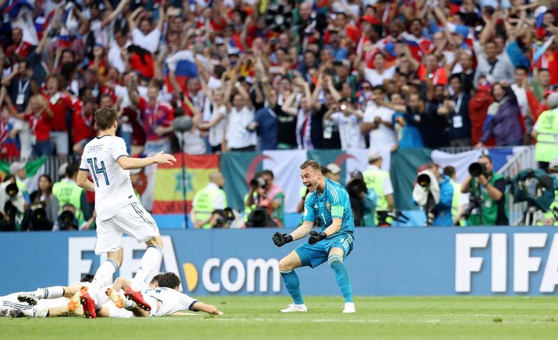 epa06855770 Goalkeeper Igor Akinfeev of Russia celebrates after making the winning safe in the penalty shootout of the FIFA World Cup 2018 round of 16 soccer match between Spain and Russia in Moscow, Russia, 01 July 2018.

(RESTRICTIONS APPLY: Editorial Use Only, not used in association with any commercial entity - Images must not be used in any form of alert service or push service of any kind including via mobile alert services, downloads to mobile devices or MMS messaging - Images must appear as still images and must not emulate match action video footage - No alteration is made to, and no text or image is superimposed over, any published image which: (a) intentionally obscures or removes a sponsor identification image; or (b) adds or overlays the commercial identification of any third party which is not officially associated with the FIFA World Cup)  EPA/MAHMOUD KHALED   EDITORIAL USE ONLY