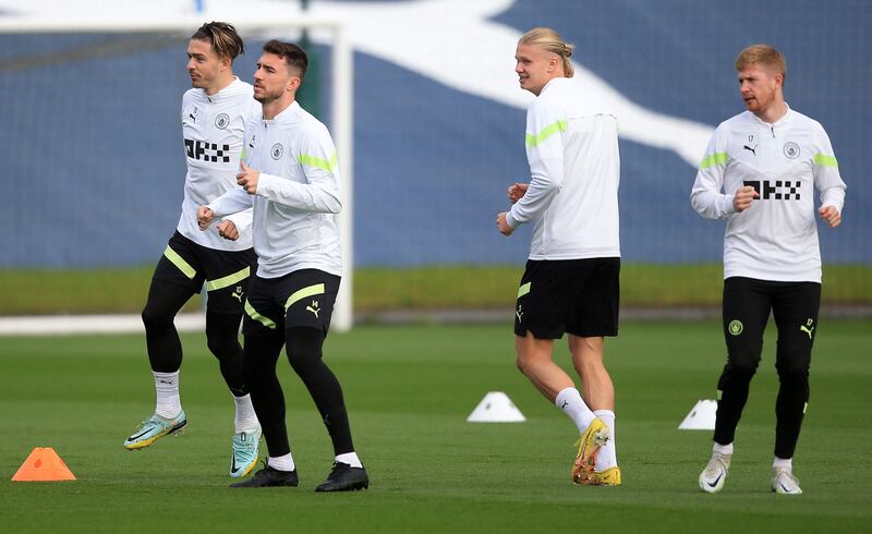 Manchester City players are put through their paces ahead of the Champions League clash with Borussia Dortmund. AFP