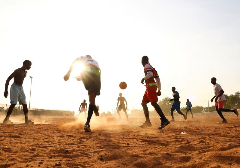 A game of football as Nigeria waits for the results of its presidential election. Reuters